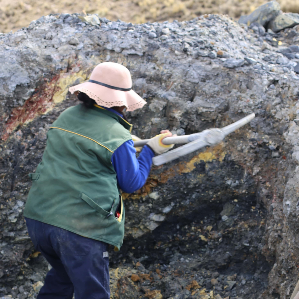 Woman Smashing Rocks